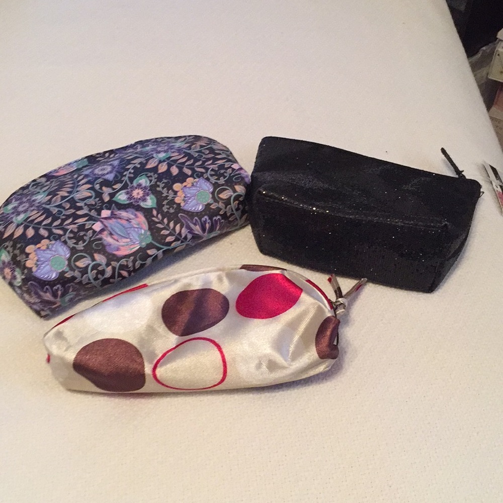 Three cosmetics. Bags. All new👜👜👜👛👛One NWT.